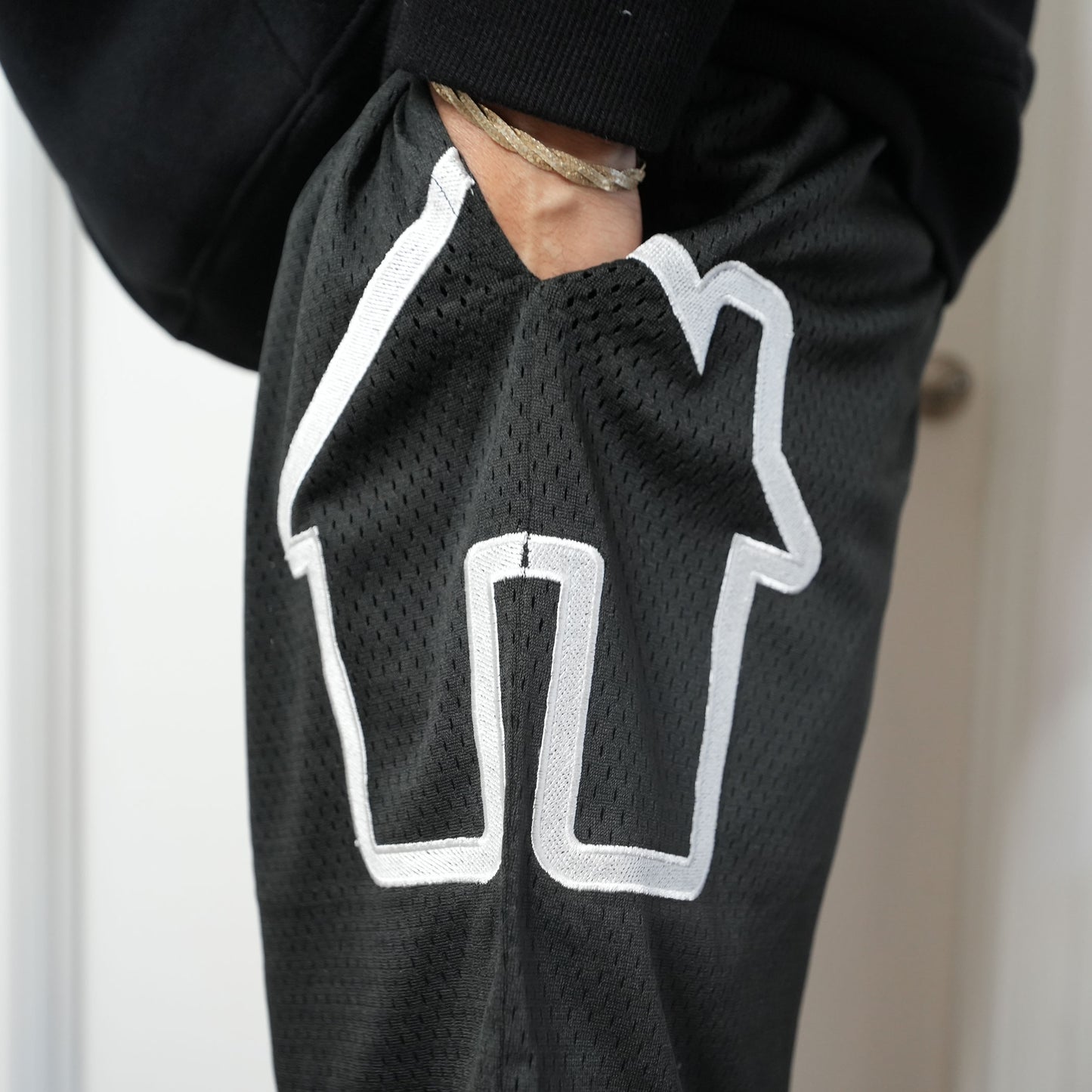 HOUSE LOGO MESH SHORTS